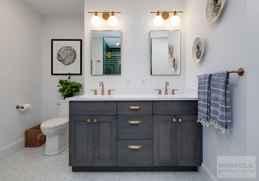 hickory double bath vanity in a gray stain with quartz countertop & brass hardware
